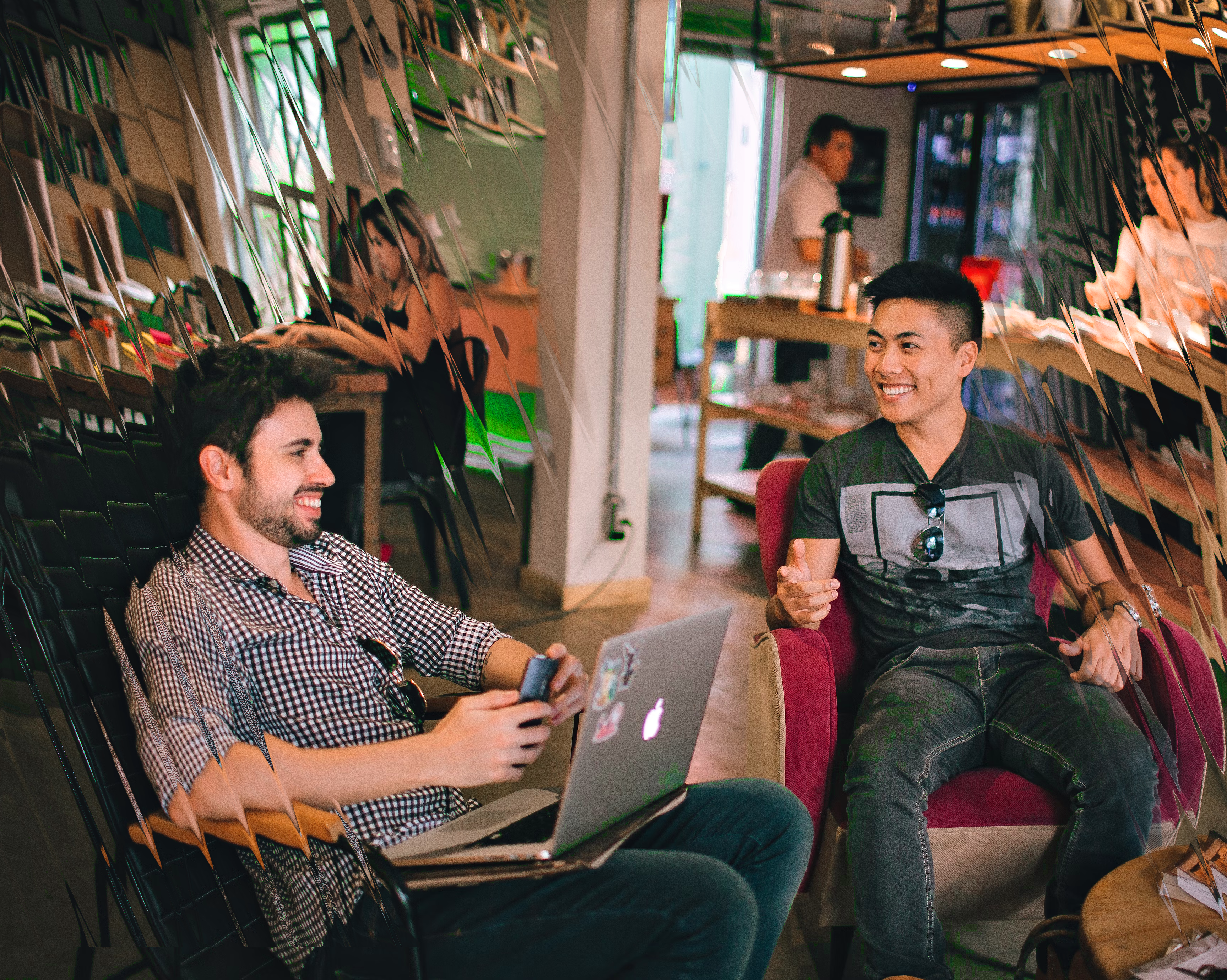 Students in bar with laptop